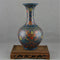 Antique vase decorated with deep blue glaze, enamel and flower pattern